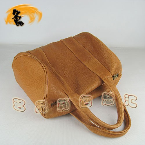 63460 熱賣新款明星酷炫 Alexander Wang/亞利山大王 鉚釘手提包 土黃色