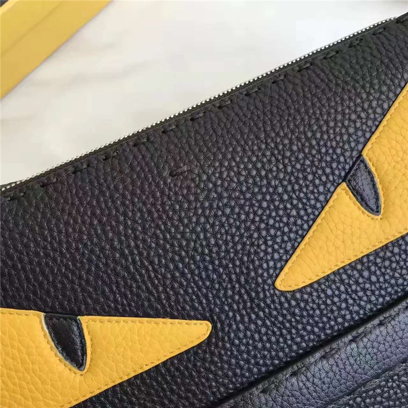 FENDI 芬迪 350D 精選小牛皮荔枝紋小惡魔黃色眼睛手拿包手抓包 黑色