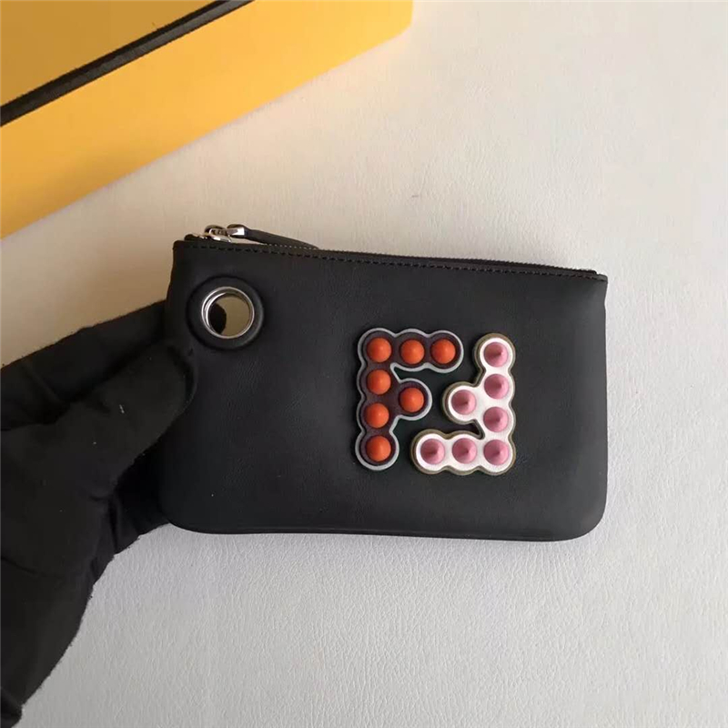 622 FENDI芬迪 F IS FEND 三套索環 拼色鉚釘手拿包 黑橙粉