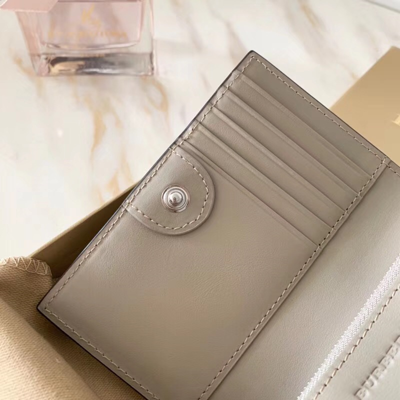 Burberry巴寶莉 全皮壓花徽章 雙折中長款 拼色錢夾 裸粉拼灰